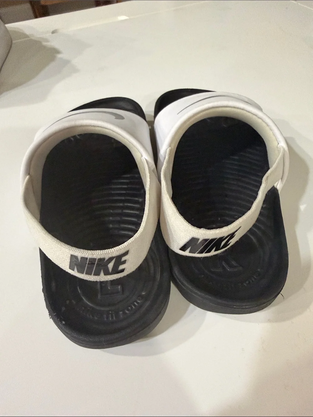 Nike Kids White and Black Slide Sandals with Swoosh